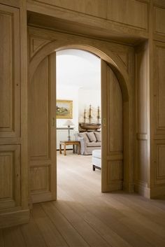 an open door leading into a living room