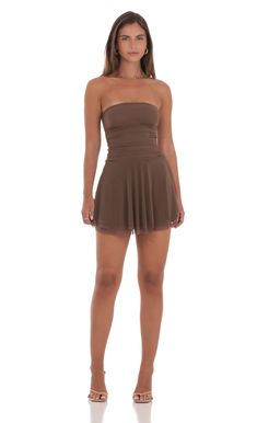 Designed in Los Angeles- Mini Length- Pull-on - Fully lined- Sheer- Made in mesh fabric- Hand wash coldModel is wearing a size small that measures 23in/58cm in lengthSlight modifications might be made to improve garment quality.Handling the garments with care, hand-washing and air-drying is strongly recommended. Brown Hoco Dress, Brown Homecoming Dresses, Short Brown Dress, Black Cowgirl Boots, Bra Tank Top, Bra Tank, Casual Day Dresses, Sorority Outfits, Straight Dress