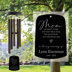 a memorial wind chime hanging from a tree