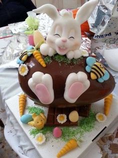 a chocolate cake with bunny ears on top