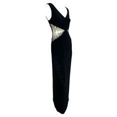 Presenting a chic black beaded Bob Mackie sleeveless gown. From the 1990s, this sexy floor-length dress features a v-neckline, column cut, and is made complete with sheer-covered cut-outs on either side of the waist. The cutouts are adorned with beautiful beadwork that gives this vintage dress the perfect sparkly Bob Mackie touch. Approximate measurements: Size - removed Bust: 34 - 36" Waist: 28 - 32" Hips: 40 - 42" Shoulder to hem: 57" Bob Mackie Dress, Bob Mackie, Sleeveless Gown, Beautiful Beadwork, Beaded Gown, Vestidos Vintage, Floor Length Dresses, Floor Length, Cut Out