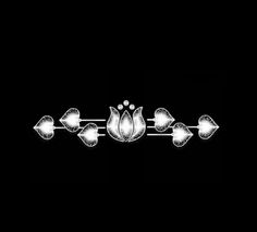 a black and white photo of a light fixture with four lights on each side of it