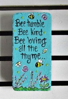 a painted rock that says bee humble bee kind, bee loving all the time