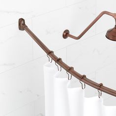 a shower curtain rod attached to the side of a bathtub