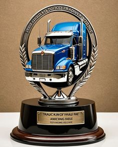 a blue semi truck trophy sitting on top of a table