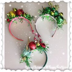 two mickey mouse ears with christmas decorations on them