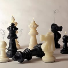 the chess set is made out of black and white pieces