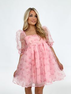 Indulge in romance with our Love In Bloom Babydoll Dress. Featuring a delicate floral mesh overlay and playful puff sleeves, this dress exudes a whimsical and elevated charm. Sweet and girly, it's perfect for a date night or any special occasion. The square neckline and ruffle detailing add a statement touch to the mini fit. Bring love to the forefront of your wardrobe with this enchanting dress. Self 100% Polyester Contrast 100% Polyester Lining 100% Polyester Hand wash cold. Enchanting Dress, Love In Bloom, Kawaii Sweater, Dress Inspo, Mesh Overlay, Square Necklines, Dress Ideas, Babydoll Dress, In Bloom