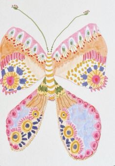 a colorful butterfly painted on top of white paper