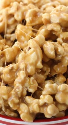 a bowl filled with nuts on top of a table