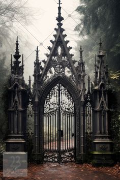 an ornate gate in the middle of a forest