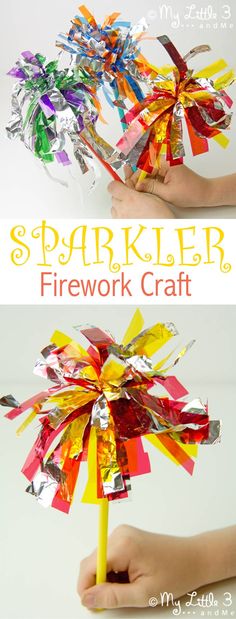 a hand holding a firework craft made out of paper and tinfoils with the words sparkler on it