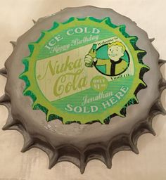 a bottle cap with an ice cold logo on it