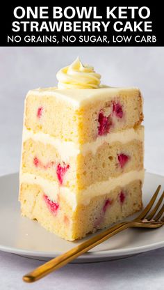 there is a piece of cake on the plate with strawberries and cream frosting