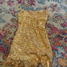 Brand New Never Used Only Missing Tag. Beautiful Shimmer Glittery Sparkly Teired Dress. Open Back Criss Cross And Zipper. This Is A Mini Dress Cascades And An Angle Breasts Has Padding! Sparkly Gold Dress Short, Glamorous Mini Dress For Festive Summer Occasions, Glamorous Mini Dress For Festive Summer, Glamorous Mini Dress For Summer Festive Occasions, Glamorous Mini Dress For Summer Festivities, Summer Festive Glitter Dresses, Glamorous Summer Mini Dress For Holidays, Festive Mini Sequin Dress For Summer, Amazon Mini Dress For Spring Evening