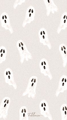 a white background with black ghost faces on it