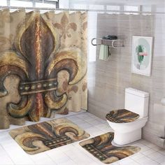 a bathroom with a shower curtain and rugs in the shape of fleurons