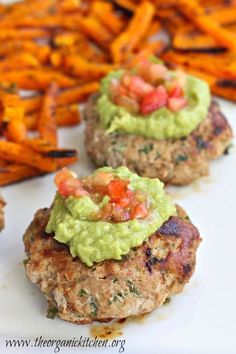 three meat patties with guacamole and carrots