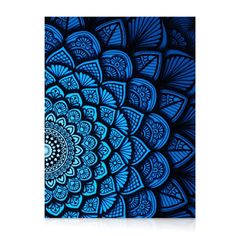 an intricate blue and black background with lots of details in the shape of a flower