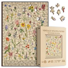 the vintage wildflowers puzzle is next to its box