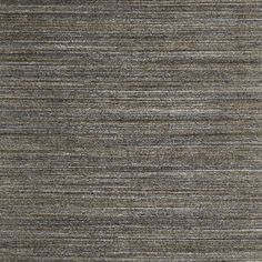 an area rug with grey and black stripes