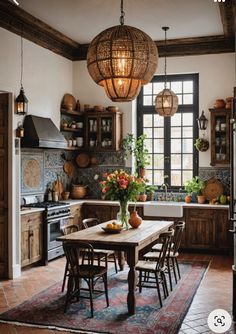 a kitchen with a table and chairs in it