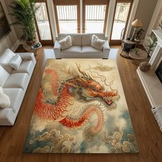 a living room filled with white couches and a large rug covered in a dragon design