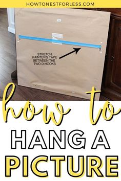 how to hang a picture frame on the floor with text overlay that reads how to hang a picture frame