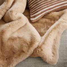 Snuggle up to our faux fur throw as cozy and luxe as the real thing. The blanket in a ginger-inspired beige adds fluffy texture and a luxurious look draped over a sofa back or folded on the foot of a bed.   • 100% recycled polyester  • Machine wash, tumble dry low  • Non-chlorine bleach when needed  • Do not iron or dry clean  • Imported Ginger Beige Faux Fur 70"x55" Throw Blanket Halloween Popcorn Mix, Black Pillow Covers, Plaid Pillow Covers, Brown Bed, Thick Blanket, Fluffy Texture, Plaid Pillow, Black Pillows, Fur Throw