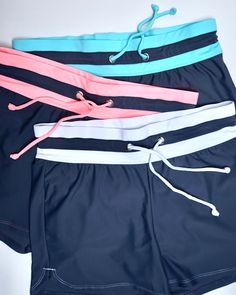 Get ready for the ocean with these drawstring women's swim shorts. Beach Swimwear With Built-in Shorts And Tie-side Bottom, Stretch Tankini With Built-in Shorts For Beach, Beachwear Tankini With Built-in Shorts For Poolside, Short Tankini With Built-in Shorts For Vacation, Swimwear With Built-in Shorts For Beach Season, Poolside Swim Skirt With Built-in Shorts, Sporty Tankini With Built-in Shorts For Beach Season, Casual Sports Swimwear With Built-in Shorts, Sporty Tankini With Built-in Shorts