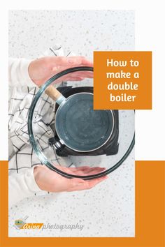 a person holding a glass bowl with the words how to make a double boiler