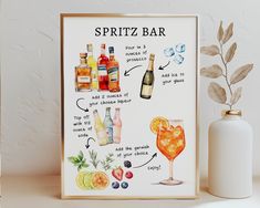 an art print with the words spritz bar on it next to a bottle of alcohol