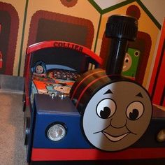 a thomas the tank engine bed in a child's bedroom