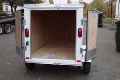 the back end of a trailer with its door open