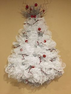 a white christmas tree made out of plastic bags