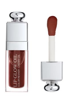 Free shipping and returns on Lip Glow Oil at Nordstrom.com. What it is: A nourishing, glossy lip oil that protects and enhances your lips to bring out their natural color.What it does: Delivering sheer coverage with a shiny finish, this nonsticky, non-greasy, rich and balmy oil combines the mirror shine of a lip gloss with the comfort of intense lip care. Enriched with cherry oil, its pampering formula creates protection against stress factors and dryi Dior Lip Glow Oil Mahogany, Dior Lip Oil Mahogany, Belongings For Dr, Cherry Bites, Hogwarts Clothes, Dior Lip Glow Oil, Dior Lip Oil, Oil Texture, Lip Glow Oil