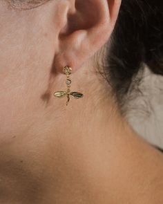 Dainty dragonflies add something unique to every look! Each one includes a delicate CZ stone. Whether you choose the bright and bold gold tones or the classic, shining silver, you'll shine bright in these beauties. Materials: 14K gold or rhodium plated brass, cubic zirconia Features: 0.9" drop, 0.2" stud, Lead & Nickel free, post back Solid Gold Bracelet, Statement Drop Earrings, Mens Accessories Jewelry, Men Earrings, Free Post, Earring Sale, Gold Earrings Dangle, Cuff Bangles, Jewelry Case