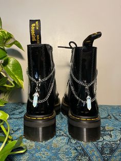 Lunar Lotus Boot Chains are the perfect way to spice up your Doc Martens or Combat Boots!  The chain length fits both Platform and Classic heel heights - Each order comes with a set of two chains of the same style - Each set is handmade. *New* Heavy Gauge Chains with detachable charms for easy mixing and matching! This Set Includes: - 2 Silver Opalite Faceted Drop Pendants (Detachable) - Clips: 14mm Silver Plated - Chain: Nickle - Fittings: Silver Plated Boot Chains, Wrap Boots, Boot Jewelry, Classic Heels, Star Gift, Doc Martens, Shoe Clips, Diy Charms, Drop Pendant