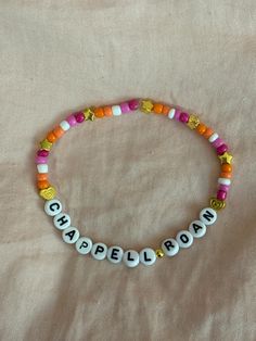 a beaded bracelet with the word chapletown written on it