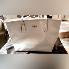 Authentic Cream/Chalk Colored, Crossgrain Leather Tote By Coach. Inside Zip, Cell Phone & Multifunction Pockets; Zip Closure, Handles W/ 9 1/2" Drop; 16" (L) X 10 1/2" (H) 5 1/2" (W) Tag Still Attached. Non-Smoking Home. Brand New Never Used Has No Marks Or Stains At All! Patchwork Tote Bags, Coach Satchel, Bags Coach, Art Bag, Zip Tote, Black Shoulder Bag, Satchel Purse, Coach Leather, Vintage Handbags