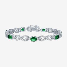 This elegant infinity tennis bracelet features a series of shimmering 140 Lab-Grown sapphires and 7 mined topaz stones. Perfect for adding sophistication to any outfit.Features: Quick ShipSetting: ProngShape: InfinityStone Cut: OvalMetal Color: WhiteChain Length: 7 1/2 InchChain Construction: CastedCare: Wipe CleanStone Type: 7 Simulated Emerald, 147 Lab Created SapphireAuthenticity: Simulated StoneBracelet Type: Tennis BraceletsMetal: Sterling SilverIs Beaded: NoCountry of Origin: Imported Green Cubic Zirconia Tennis Bracelet For Formal Occasions, Elegant Silver Tennis Bracelet With Emeralds, Elegant Adjustable Green Tennis Bracelet, Green Cubic Zirconia Crystal Bracelet, Luxury Green Diamond-accented Tennis Bracelet, Emerald Gemstone Tennis Bracelet, Gift, Engagement Rings Opal, Topaz Stone, Tennis Bracelet