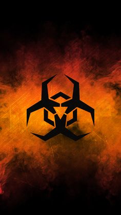 an orange and black background with some type of abstract design on the bottom right corner