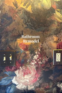 the bathroom is decorated with colorful flowers and gold trimmings, including two light switch plates