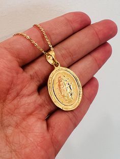 Pendant Size: 19mm x 28mm + Bail Necklace Length: 16" or 18" Material: 18kt Gold Filled Model wearing 18" Cable. About Gold Filled JewelryWhat is gold-filled? We carry gold filled jewelry that is composed of a solid layer of 18kt gold, that is bonded to a base metal.Gold Filled and vermeil jewelry are great quality alternatives to solid gold. With proper care and storage you will have jewelry that will last a lifetime. Tips to make your jewelry last:1. Keep it dry. Store your jewelry in the plastic bag included in your purchase.2. Avoid harsh chemicals such as perfume, hairspray, lotions and oils.3. Never use abrasive products to clean your jewelry. Miraculous Medal Necklace, Miraculous Medal, Gold Necklace Women, Vermeil Jewelry, Gold Filled Earrings, Necklace Box, Chain Anklet, Gold Filled Jewelry, Stainless Steel Necklace