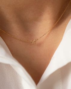 14k gold dainty bow necklace  Small, petite bow makes it perfect for everyday necklace. * 14k Yellow Gold * Bow measures about 6mm Same style bracelet: https://www.etsy.com/listing/1613477197/14k-mini-bow-bracelet-dainty-ribbon-bow?click_key=3f15f81be1d453ba05d6e2a4491c8d3fcad90b9e%3A1613477197&click_sum=8d2f380f&ref=shop_home_active_1&frs=1&sts=1 ■ OUR POLICIES https://www.etsy.com/shop/EandEProject/policy?ref=shopinfo_policies_leftnav ■ VISIT OUR ETSY SHOP www.eandeproject.etsy.com ■ MESSAGE U Delicate Bow Jewelry As Gift, Minimalist Gold Jewelry With Bow, Delicate Bow Jewelry For Gifts, Delicate Bow Jewelry For Gift, Gold Dainty Bow Jewelry, Dainty Gold Jewelry With Bow Detail, Elegant 14k Gold Jewelry With Bow Detail, Elegant 14k Gold Jewelry With Bow, Dainty Bow Necklace For Gift