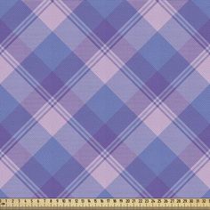 a purple and blue plaid fabric with a ruler