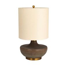 a table lamp with a white shade on top and a brown base, sitting against a white background