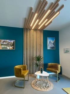 a living room with blue walls and wooden slats