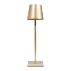 a gold lamp on a white background