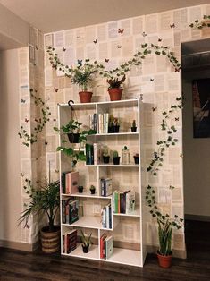 the diy book page and ivy wall is an easy way to decorate bookshelves